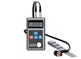 Portable ultrasonic thickness gauge used for conventional non-destructive testing.